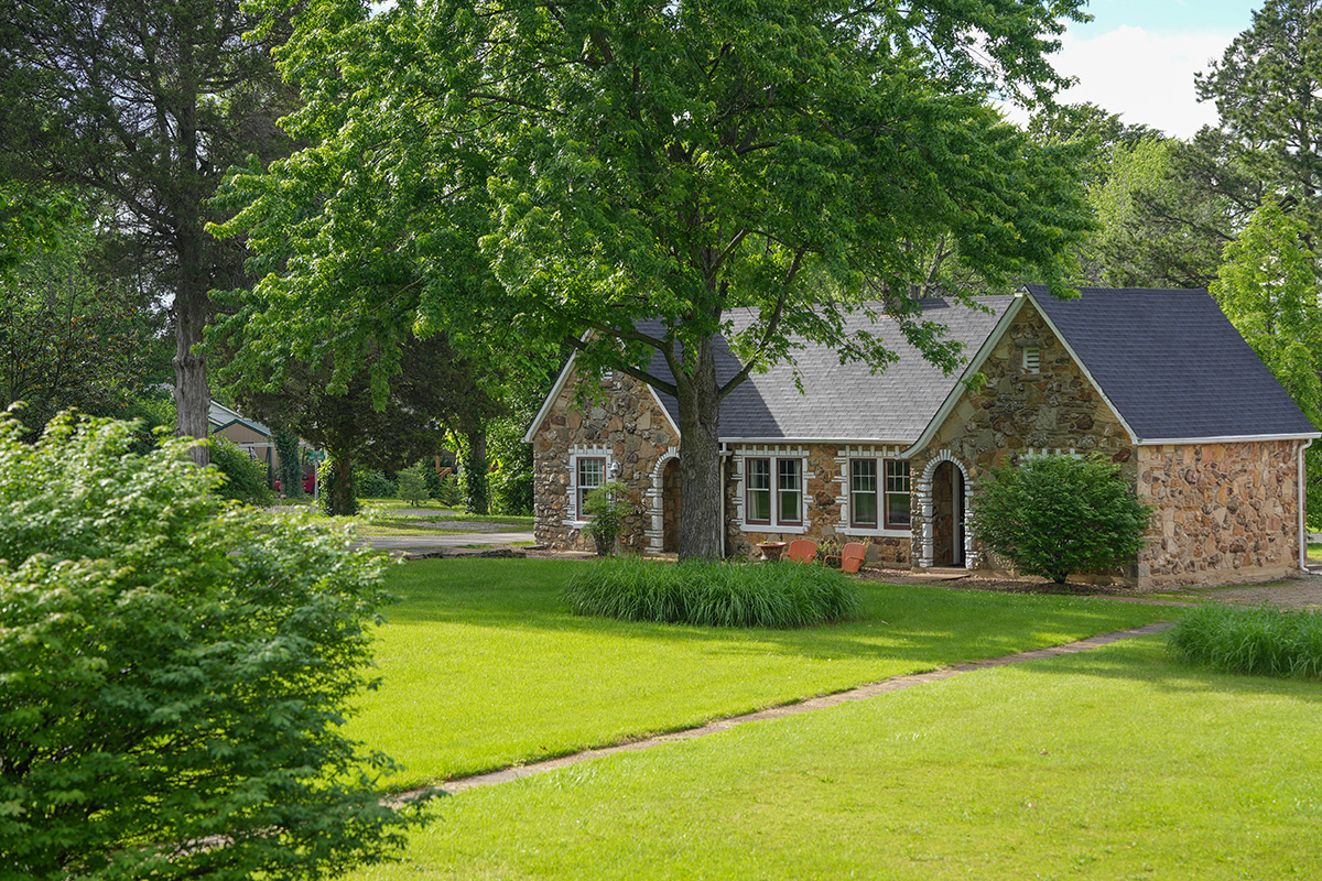 The charming stone exterior of the Wagon Wheel Motel in Cuba, Missouri
