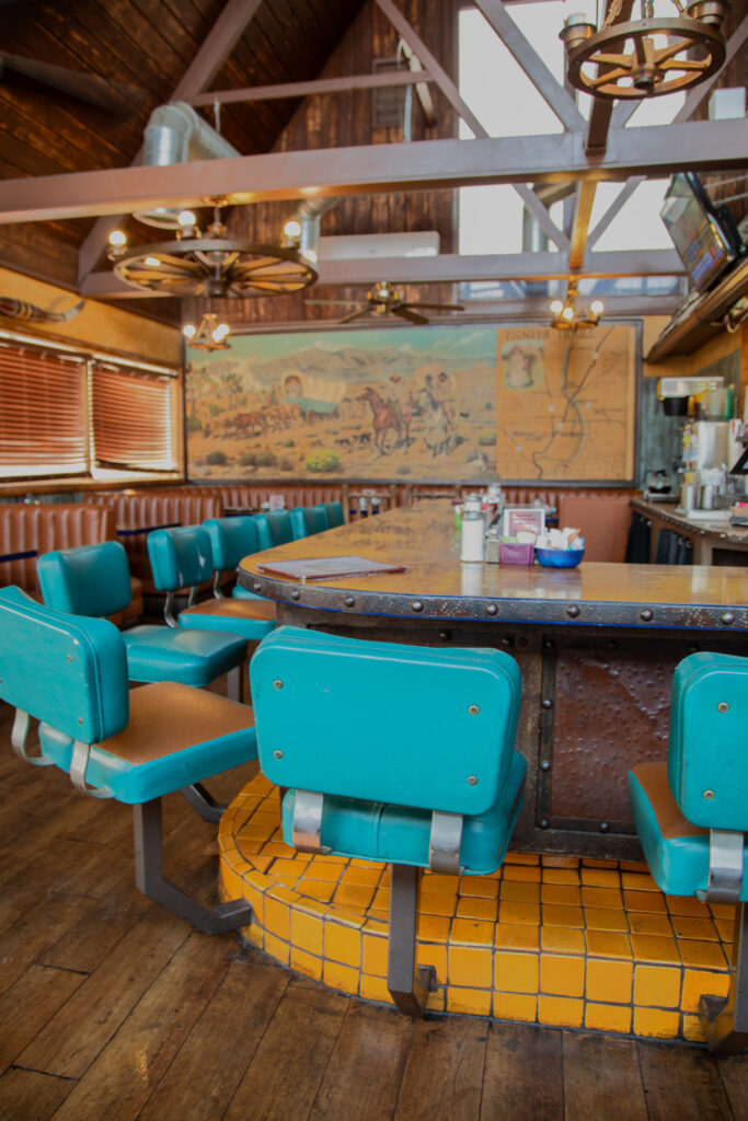 Cozy seating and Western-inspired decor at Outpost Cafe in Oak Hills, California