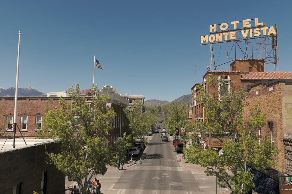The bright yellow rooftop sign at Hotel Monte Vista in Flagstaff, Arizona