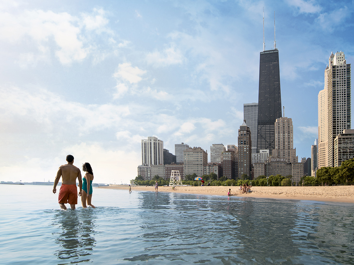 Wading in Lake Michigan at Oak Street Beach in Chicago, Illinois