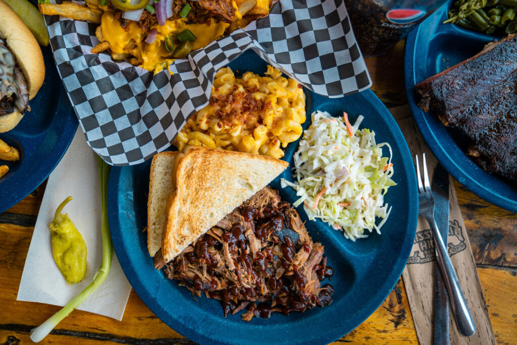 A plate of slow-smoked barbeque and sides at Missouri Hick in Cuba, Missouri