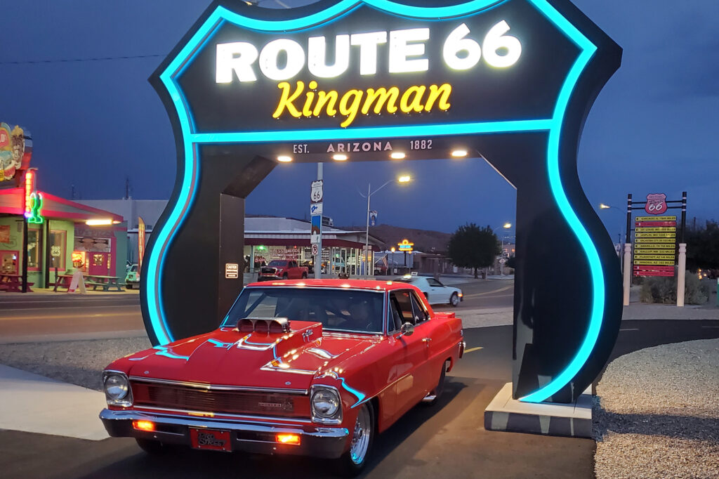 An illuminated Route 66 shield sign in Kingman, Arizona. Credit: Arizona Office of Tourism
