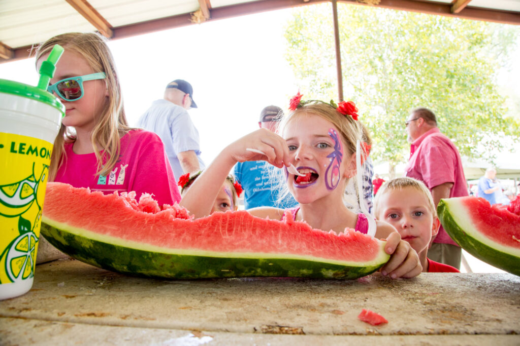 Sampling fresh watermelon at the Rush Springs Watermelon Festival in Oklahoma