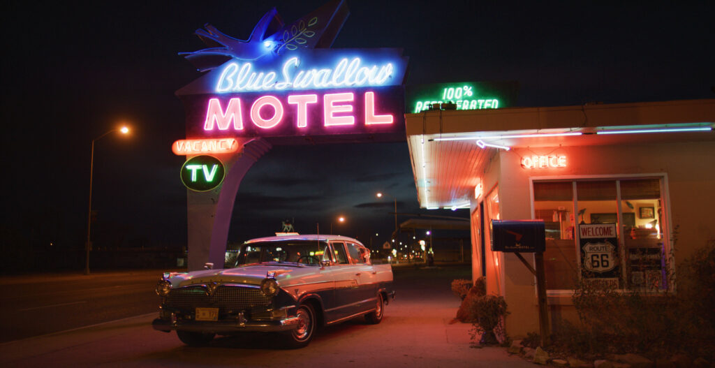 Night view of the neon sign at the Blue Swallow Motel in Tucumcari, New Mexico
