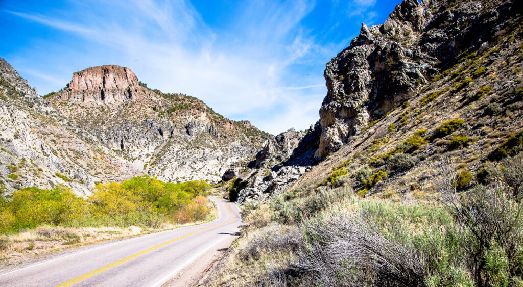 Highway cutting through rugged Spring Valley State Park