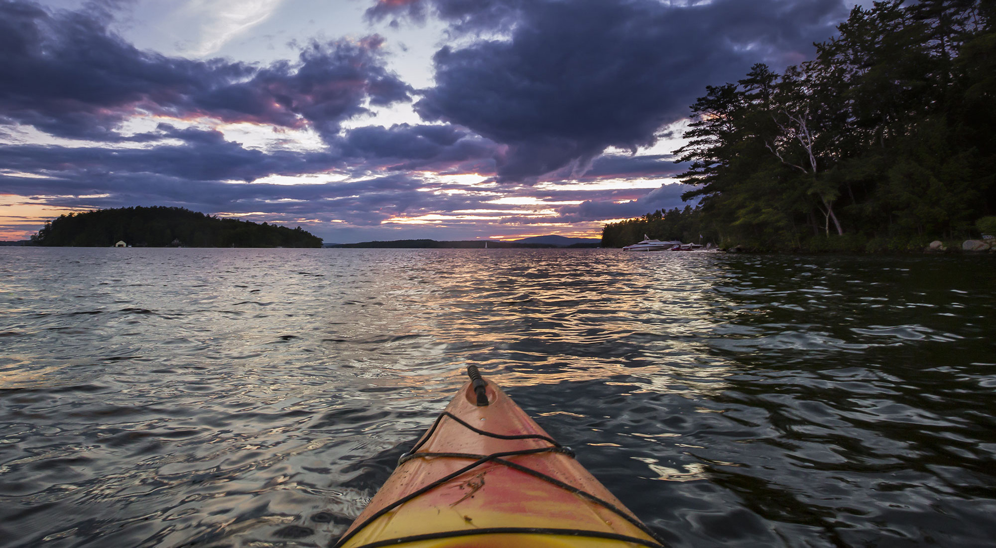 Kayaker on Lake Winnipesaukee in New Hampshire