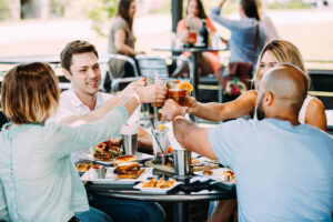 Enjoying burgers and drinks at a restaurant in Rogers, Arkansas