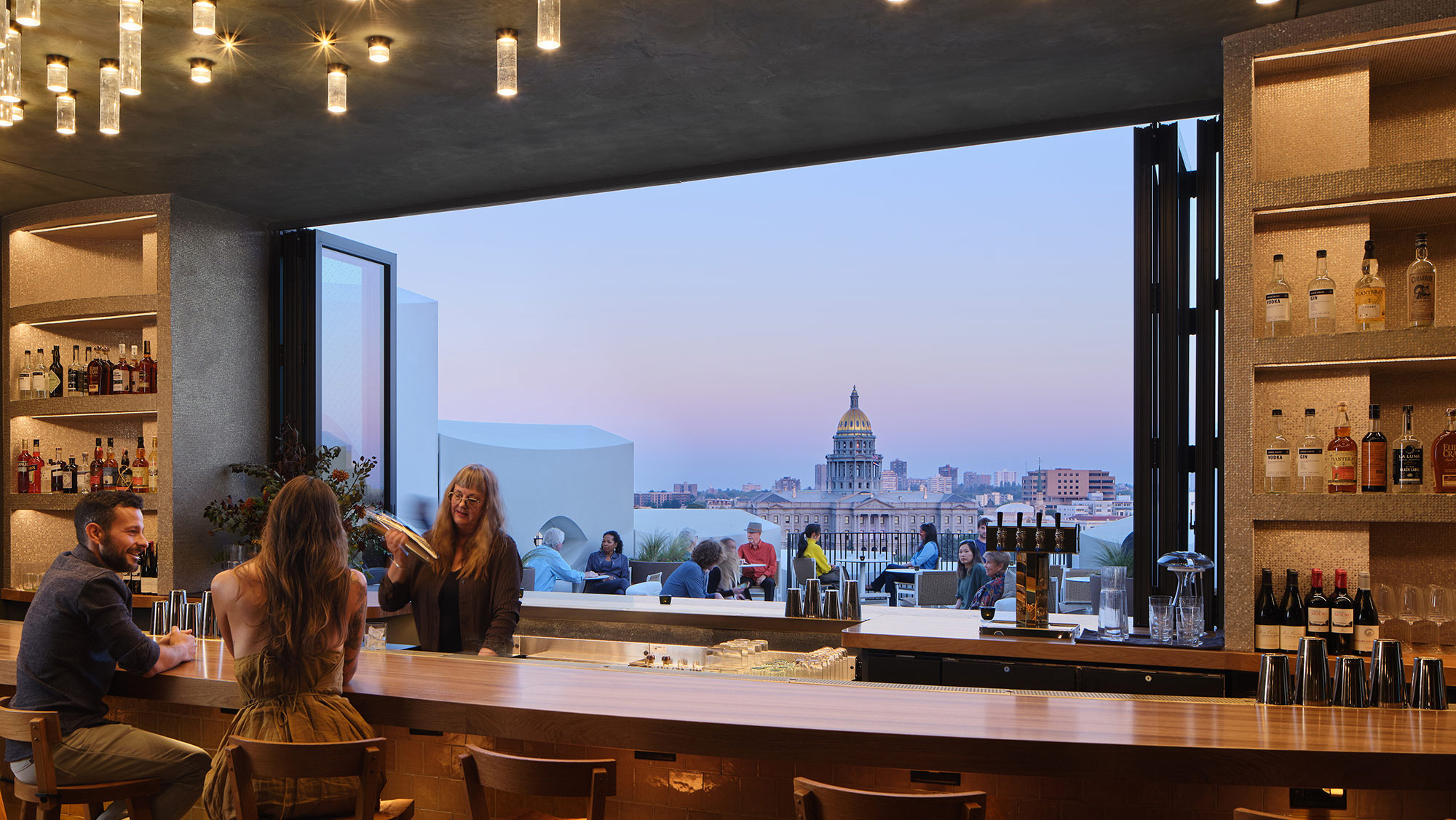 Views of the Colorado State Capitol from rooftop bar Stellar Jay in Denver, Colorado