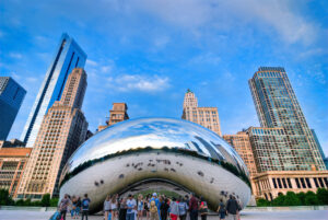 Visitors at Cloud Gate, “The Bean”, at Millennium Park in Chicago, Illinois.
