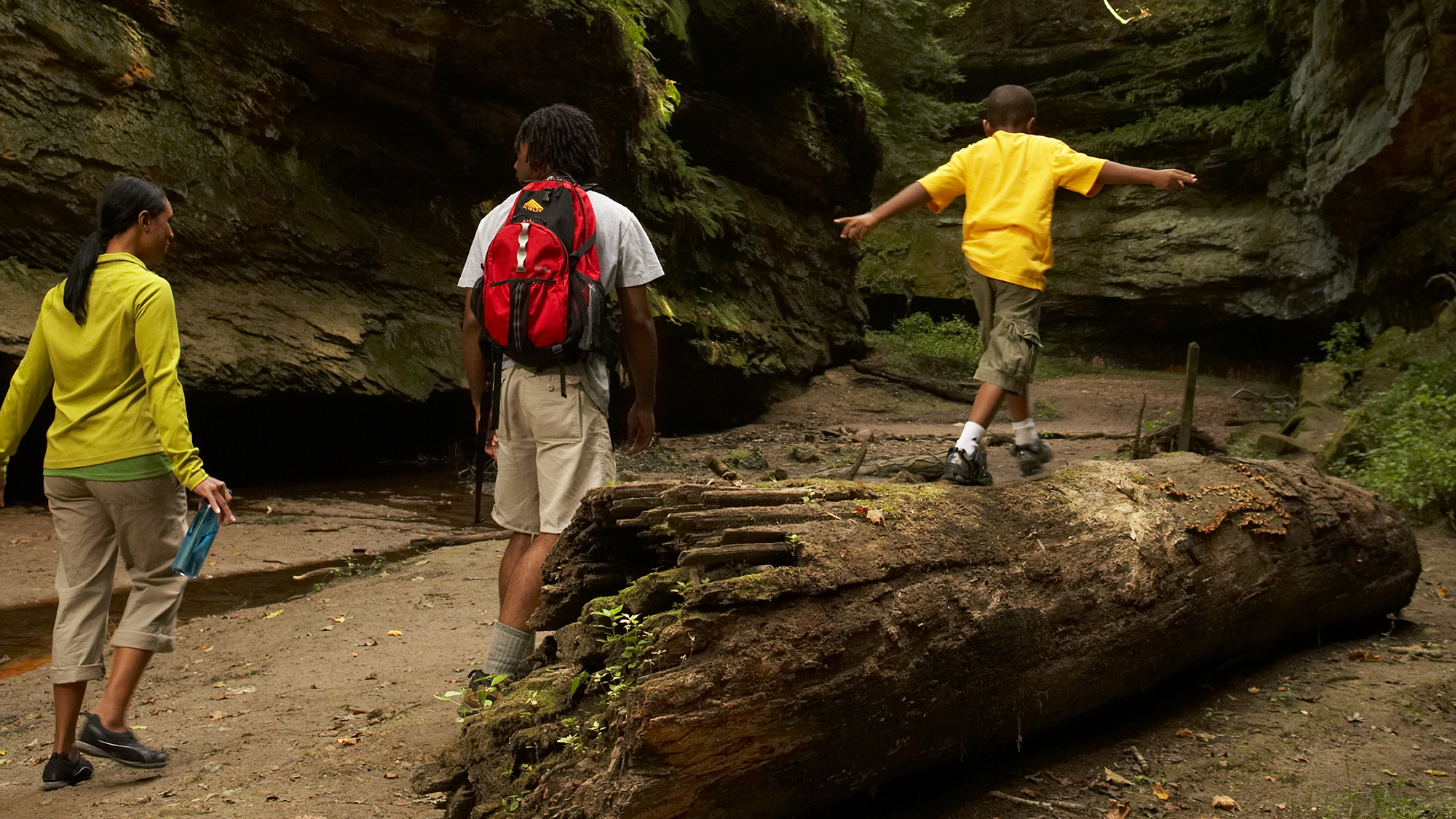 Family hiking in Turkey Run State Park near Marshall, Indiana