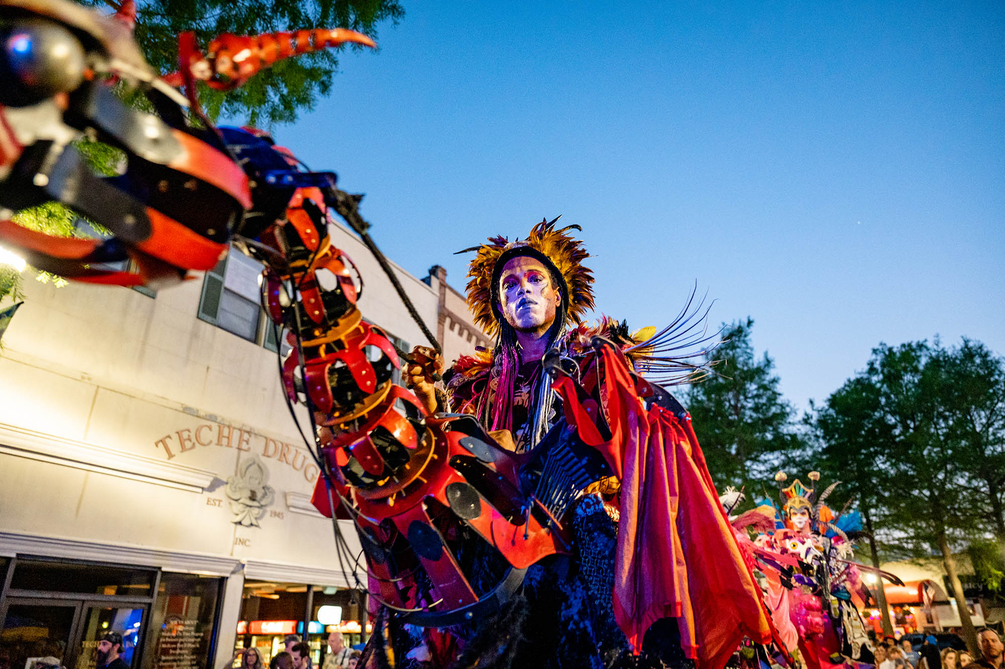 A costumed performer at the Festival International de Louisiane in Lafayette, Louisiana. Credit: Lafayette Travel