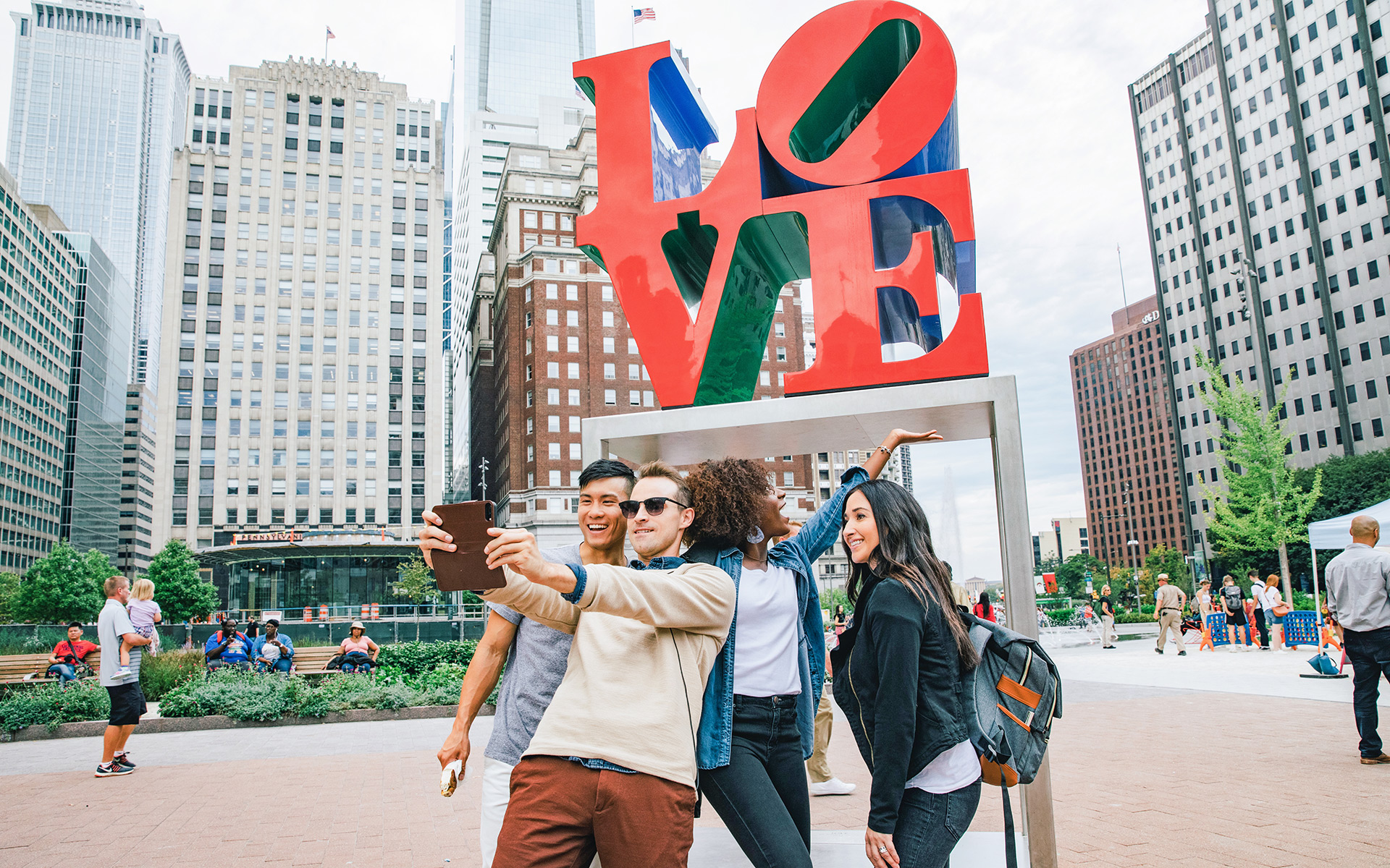 Posing with a sculpture in LOVE Park in Philadelphia, Pennsylvania