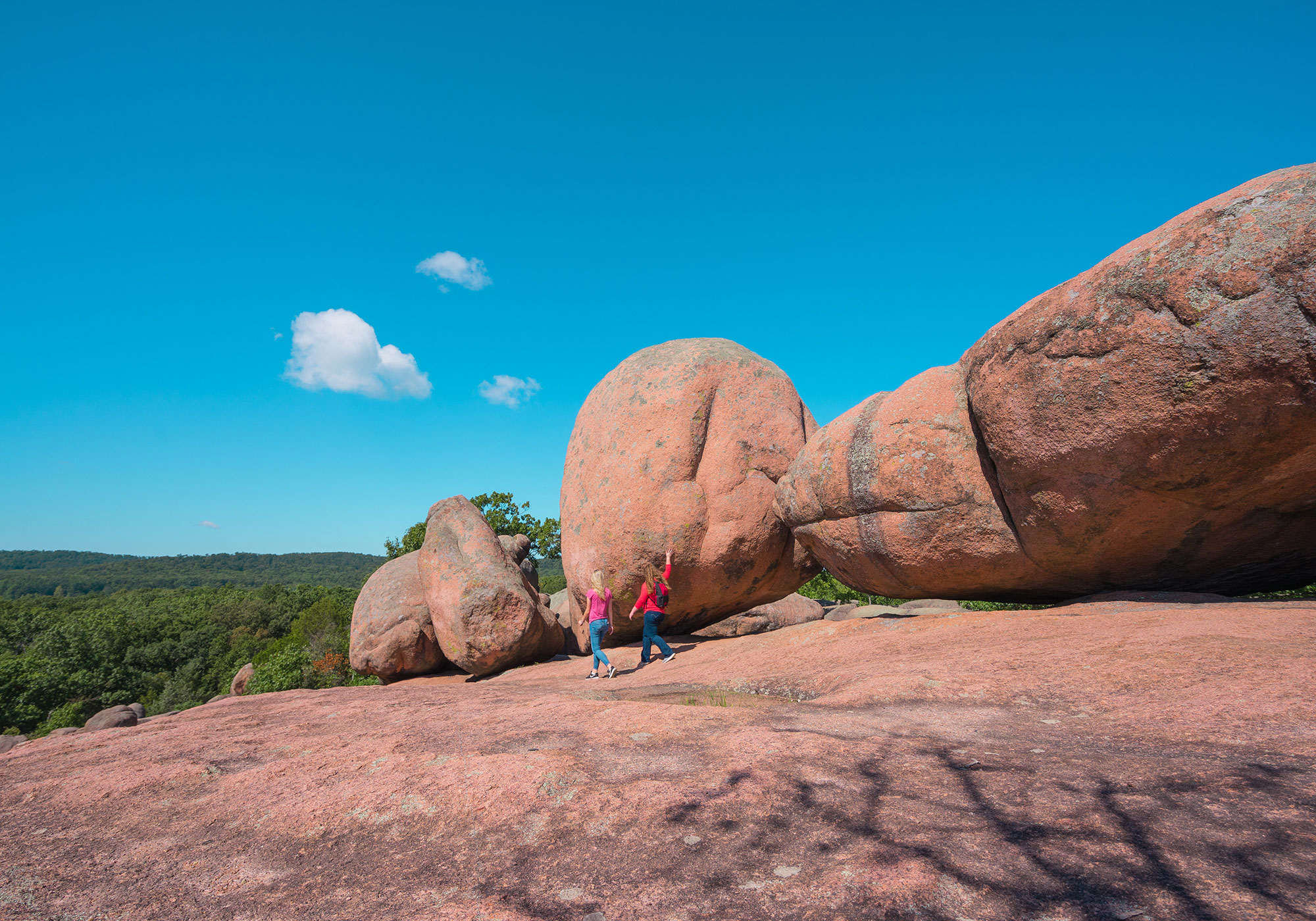 Hikers at Elephant Rocks State Park in Missouri