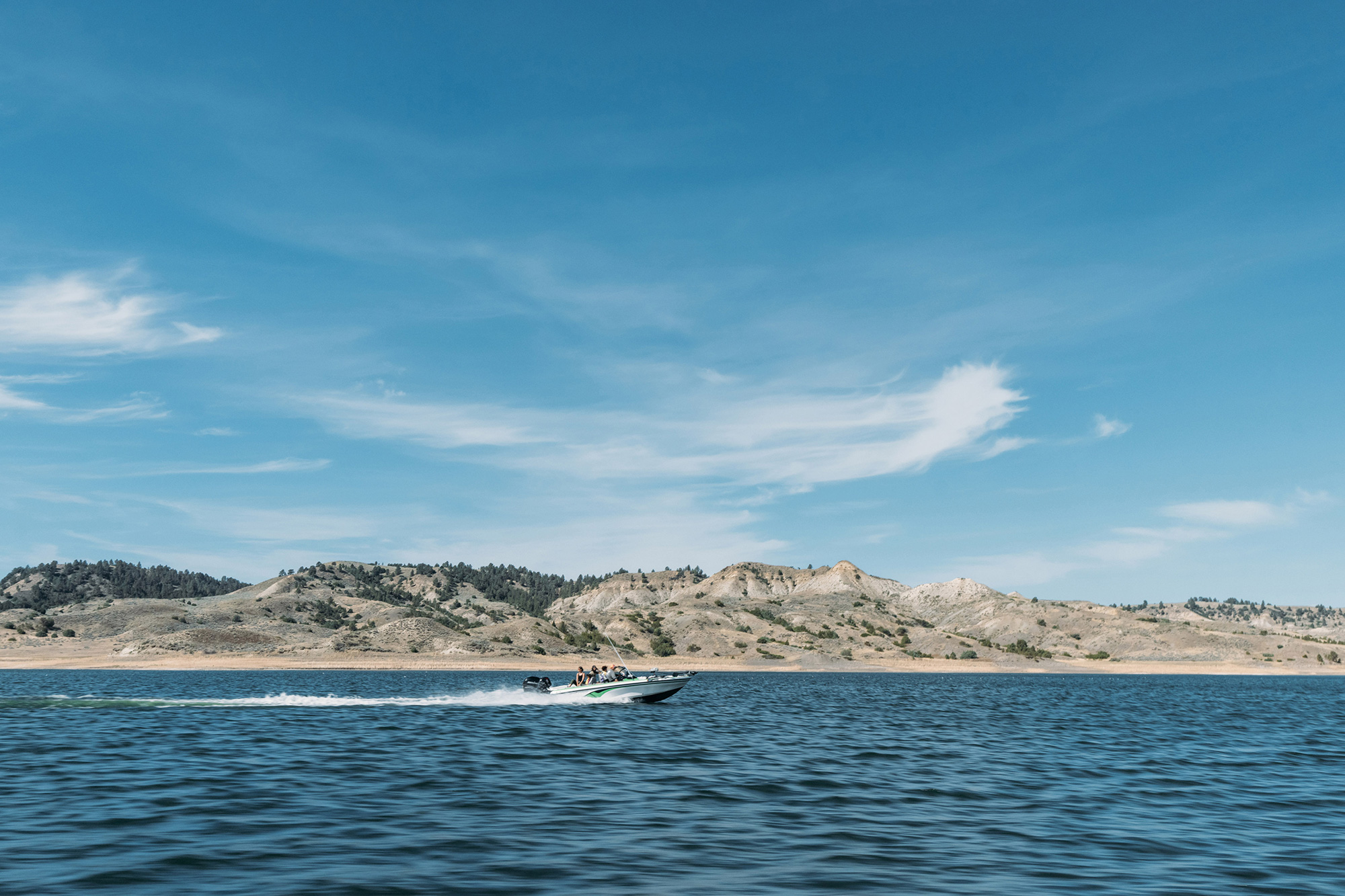 Speedboat cruising on Fort Peck Lake near Great Falls, Montana