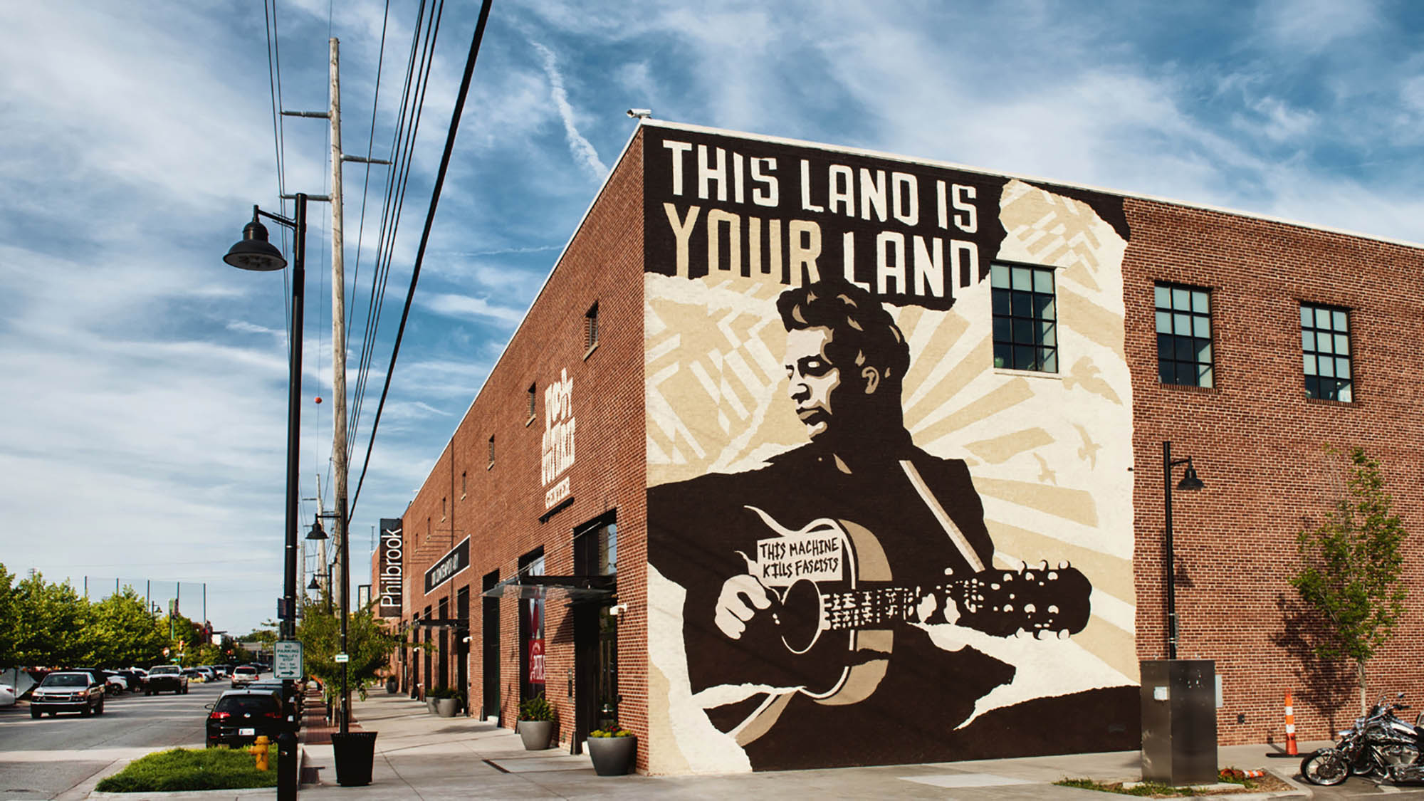 A large mural outside the Woody Guthrie Center in Tulsa, Oklahoma; Credit: Woody Guthrie Center

