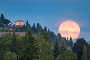 A supermoon rising over the Arbor Crest Wine Cellars estate in Spokane, Washington; Credit: Visit Spokane