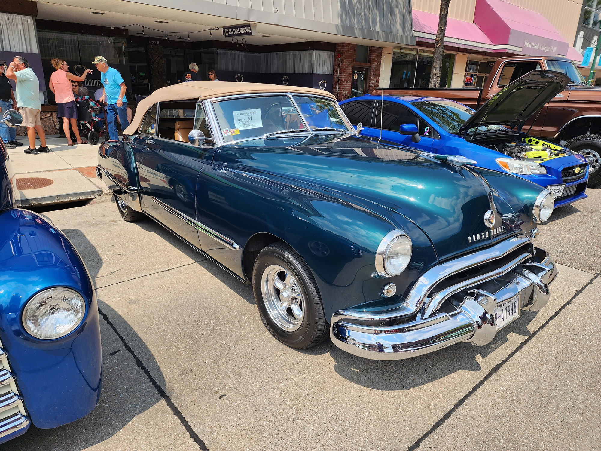 Visitors to a car show in downtown Grand Island, Nebraska