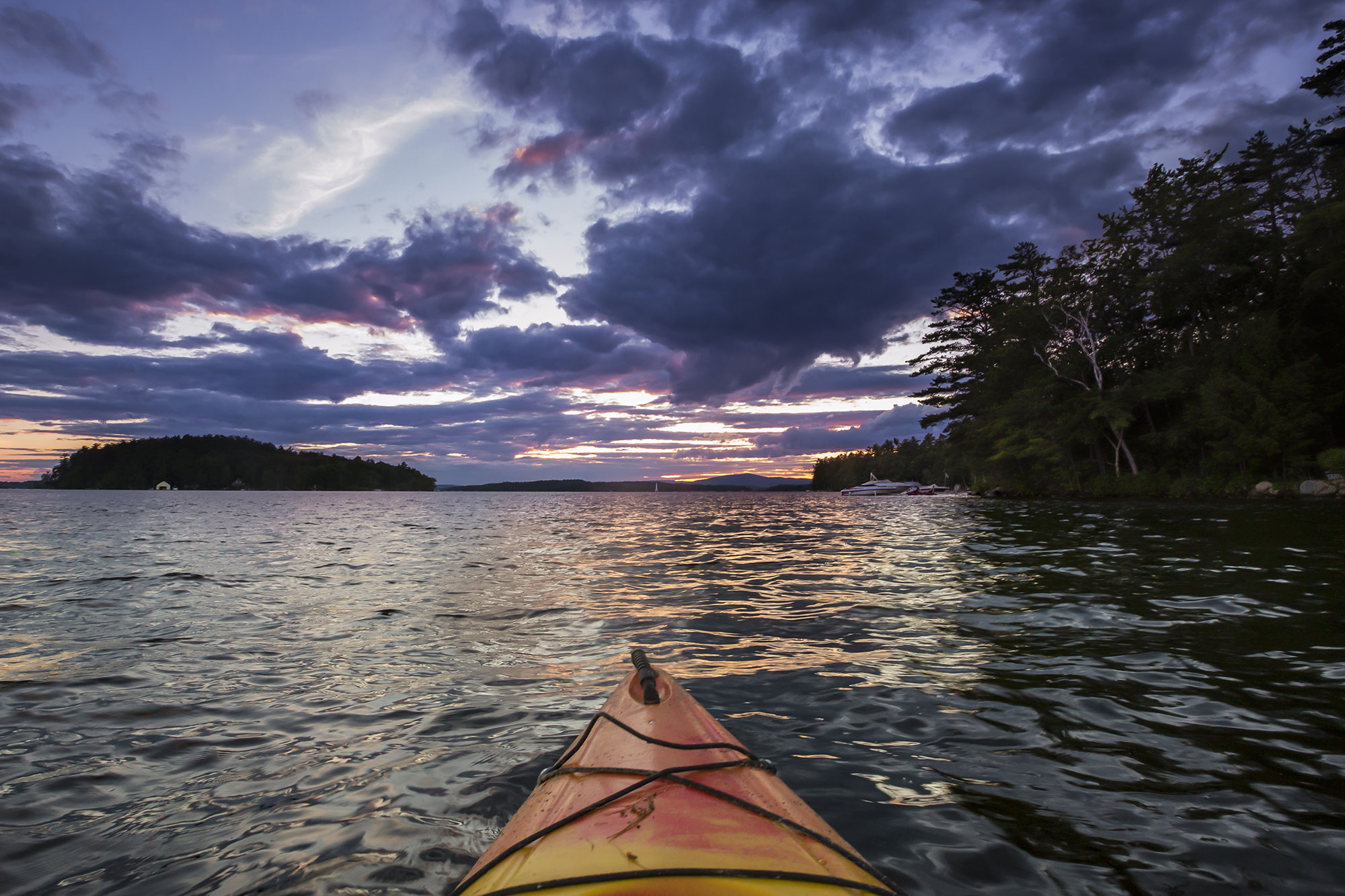 Kayaker on Lake Winnipesaukee in New Hampshire