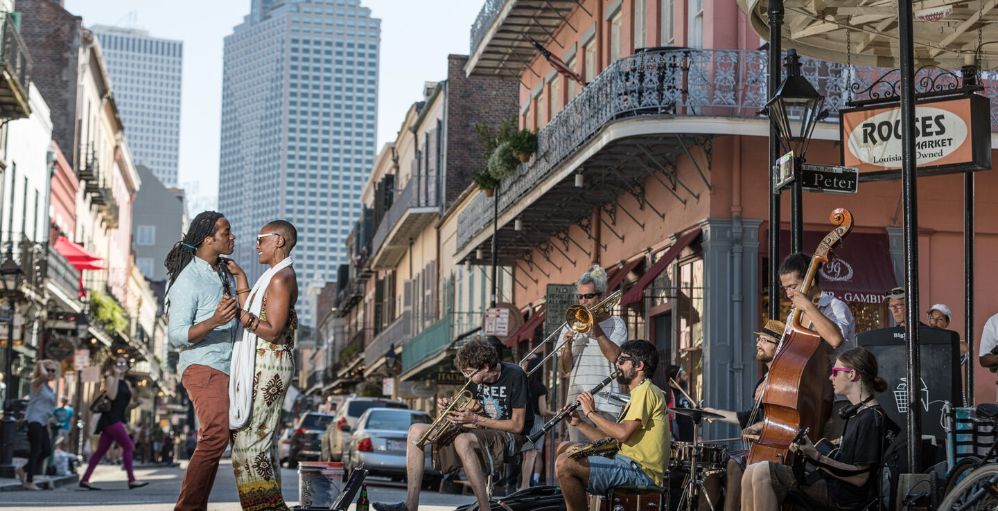 Dancing to live street music on Royal Street in New Orleans, Louisiana