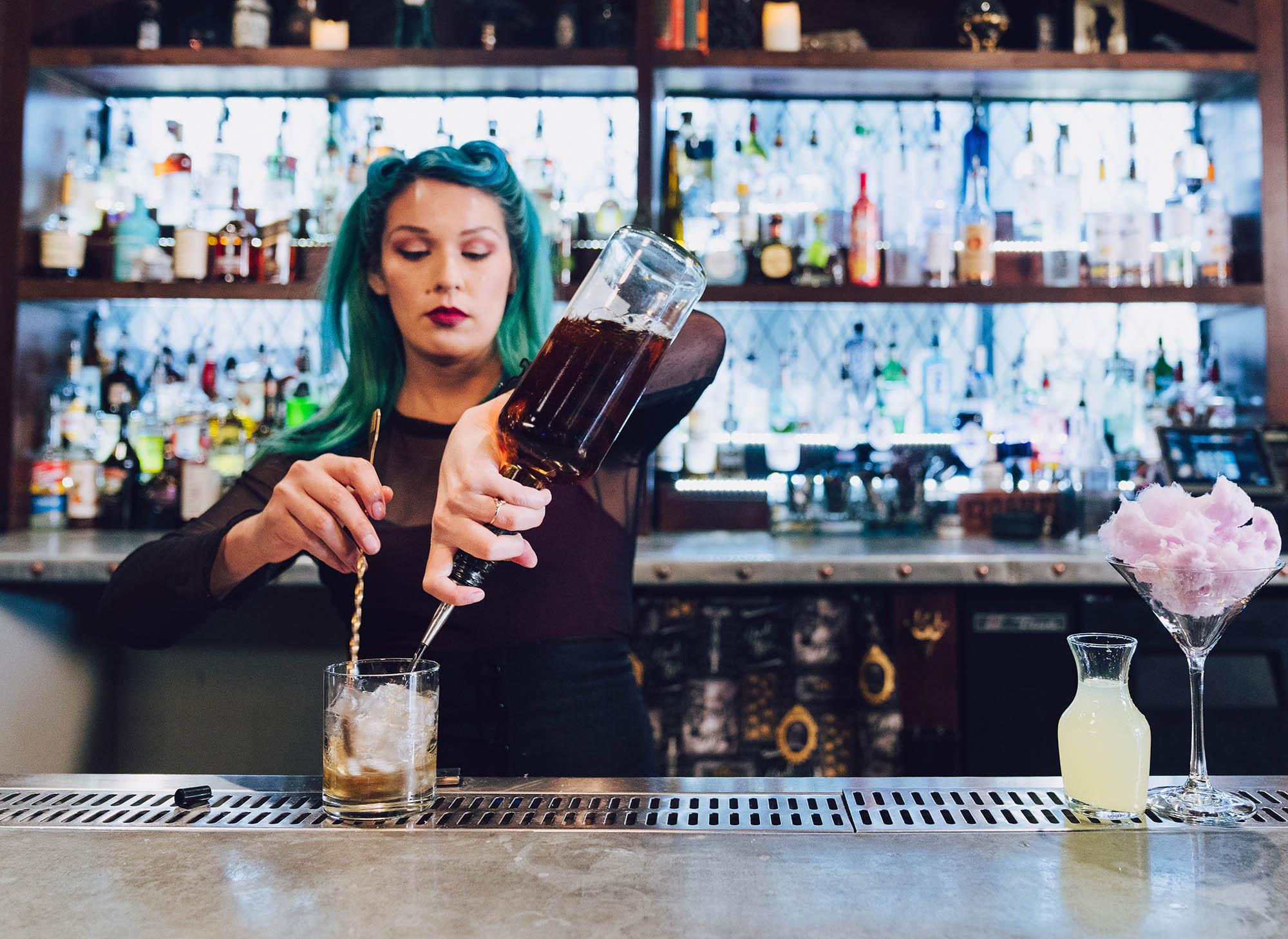 A bartender mixes a cocktail in Buena Park, California