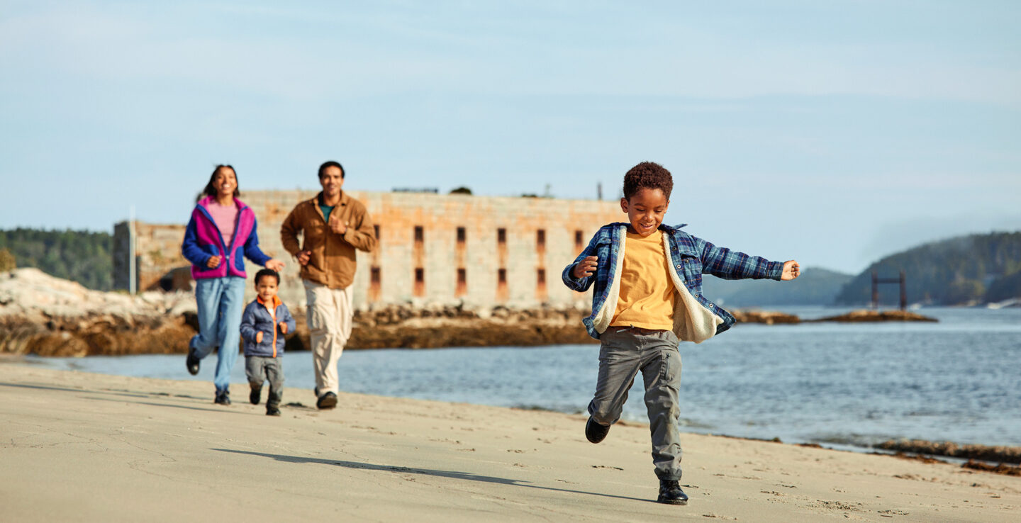 Family exploring around Fort Popham State Historic Site in Phippsburg, Maine