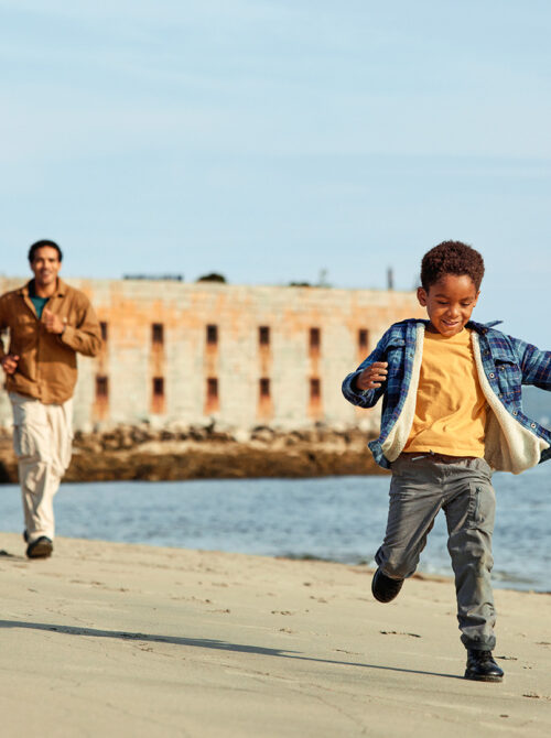 Family exploring around Fort Popham State Historic Site in Phippsburg, Maine