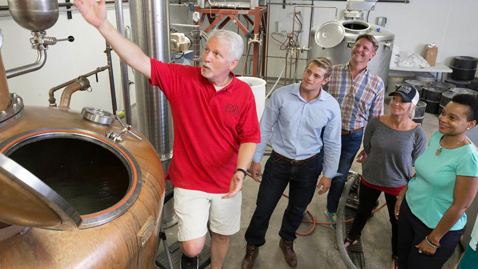 A group on a  tour of the Rock Town Distillery in Little Rock, Arkansas