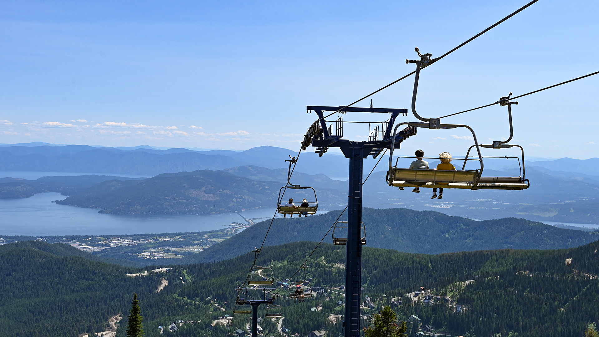 Scenic summer lift ride at Schweitzer Mountain Resort in Sandpoint, Idaho; Credit: Schweitzer