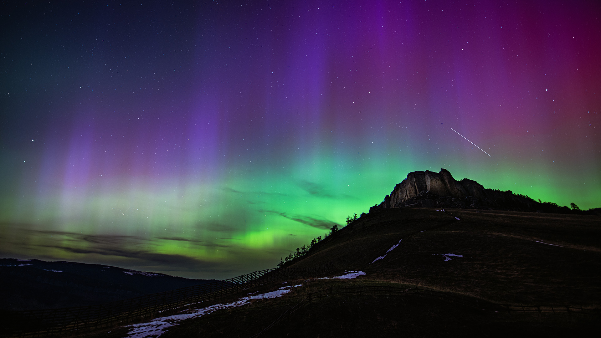 Aurora borealis over the Bighorn Scenic Byway near Sheridan, Wyoming