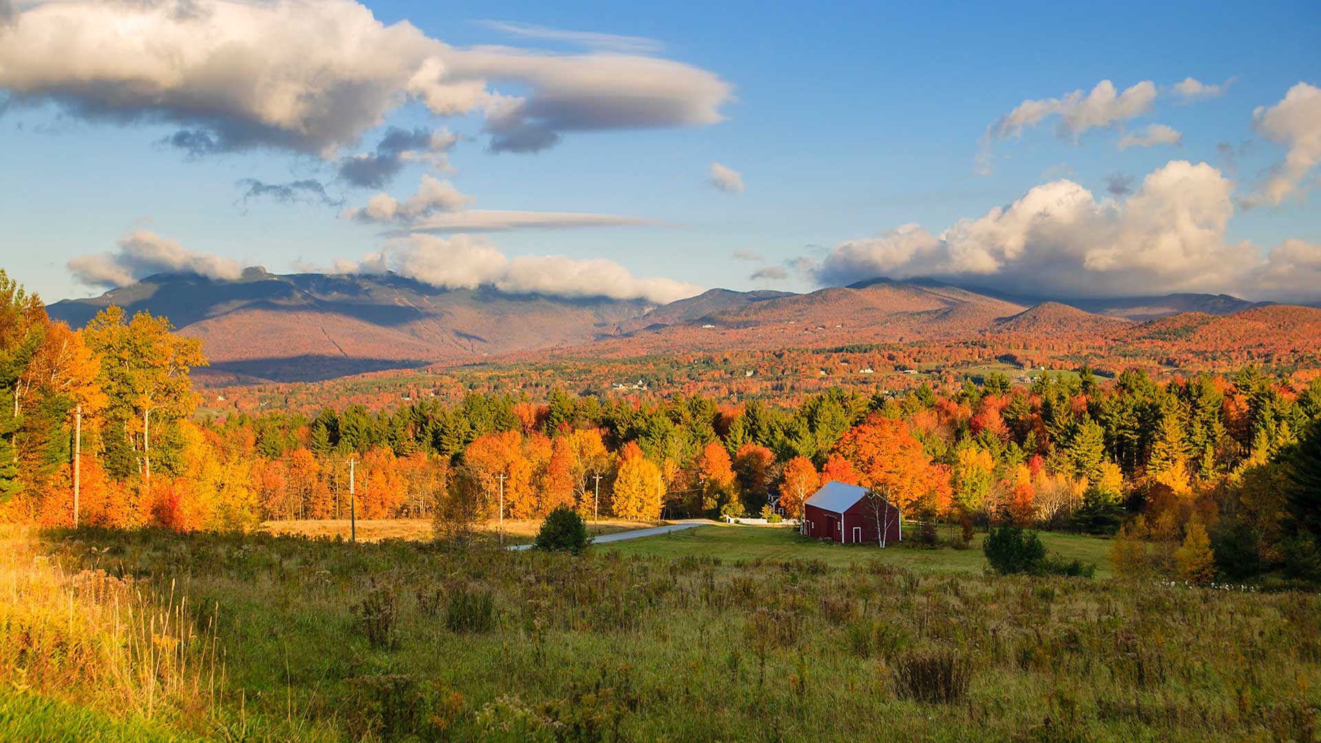 Barn surrounded by autumn colors near Mount Mansfield
