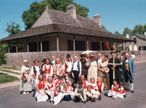 Descendants of the original French colony in front of historic Boldoc House in Ste. Geneviève, Missouri