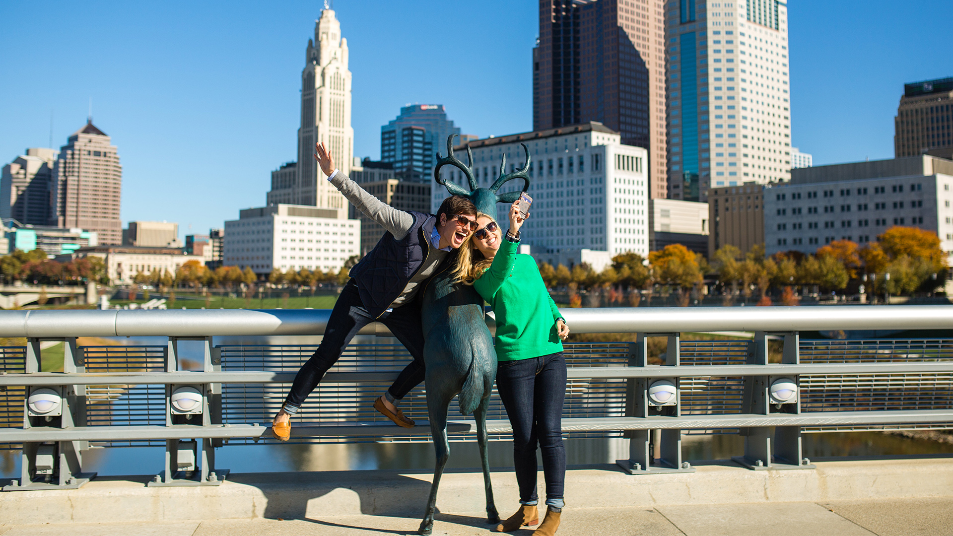 Posing in front of the downtown skyline in Columbus, Ohio; Credit: Levi Ely