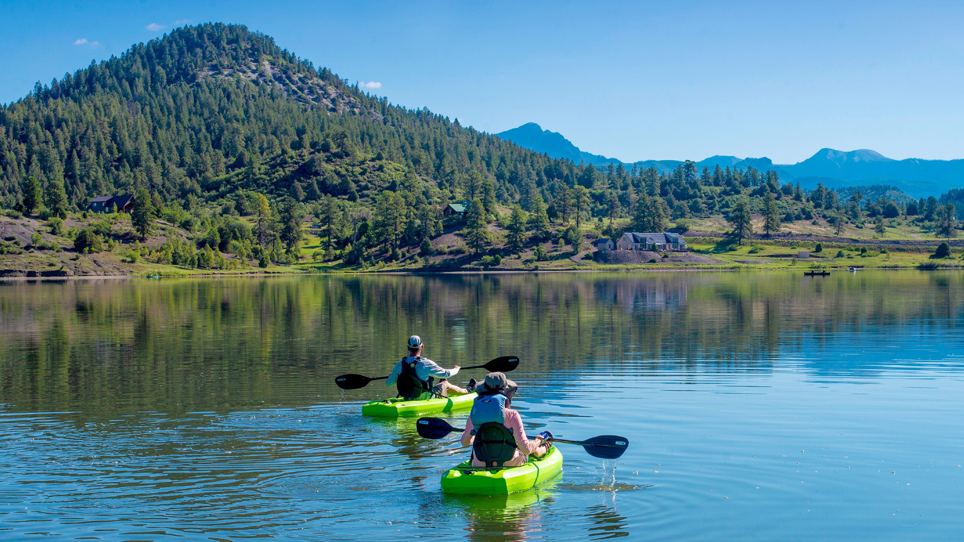 Kayakers on Williams Creek Reservoir near Pagosa Springs, Colorado 