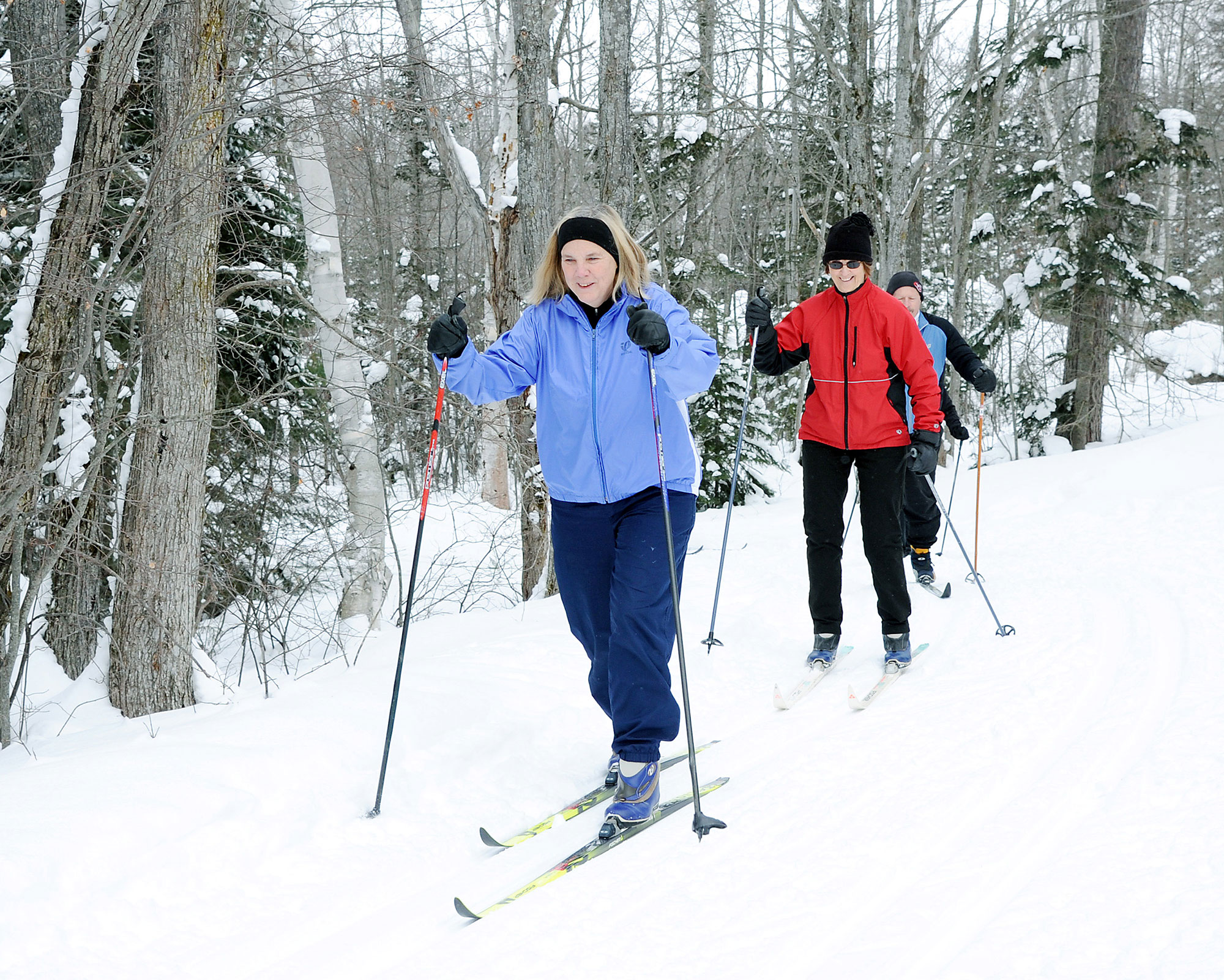 Cross-country skiers on trail near Sault Ste. Marie, Michigan; Credit: Sault CVB