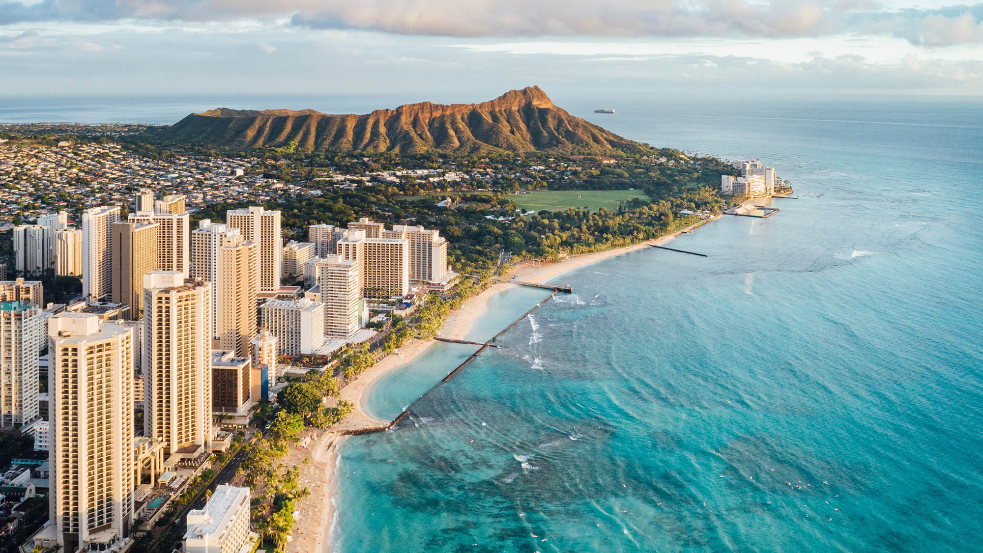 Aerial view of Honolulu and Waikīkī Beach on Oʻahu, Hawaiʻi; Credit: Vincent Lim, HTA