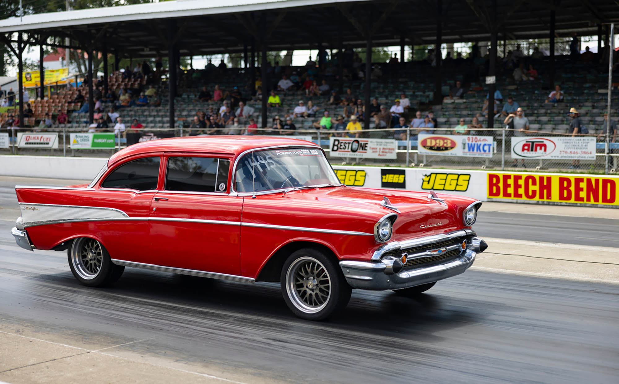 A 1957 Chevrolet Tri-Five drag racing at the Beech Bend Raceway Park in Bowling Green, Kentucky