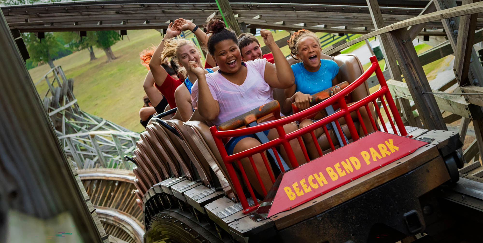 People riding the Kentucky Rumbler roller coaster at Beech Bend Amusement Park in Bowling Green, Kentucky