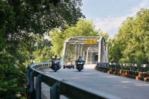 Motorcycles crossing the Devil's Elbow Bridge in Pulaski County, Missouri; Credit: Pulaski County Tourism Bureau
