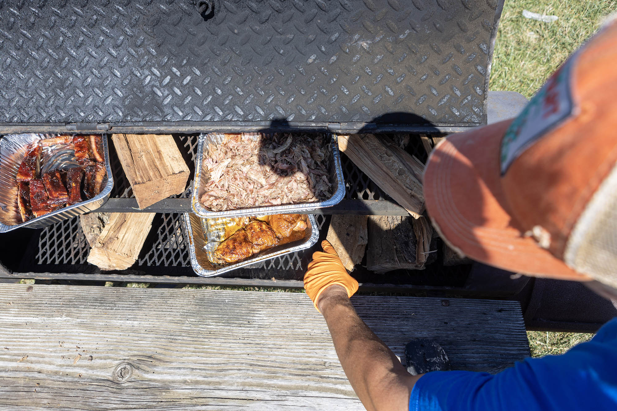 Preparing barbecue during the American Royal World Series of Barbecue in Kansas City, Missouri; Credit: Kenney Ellison