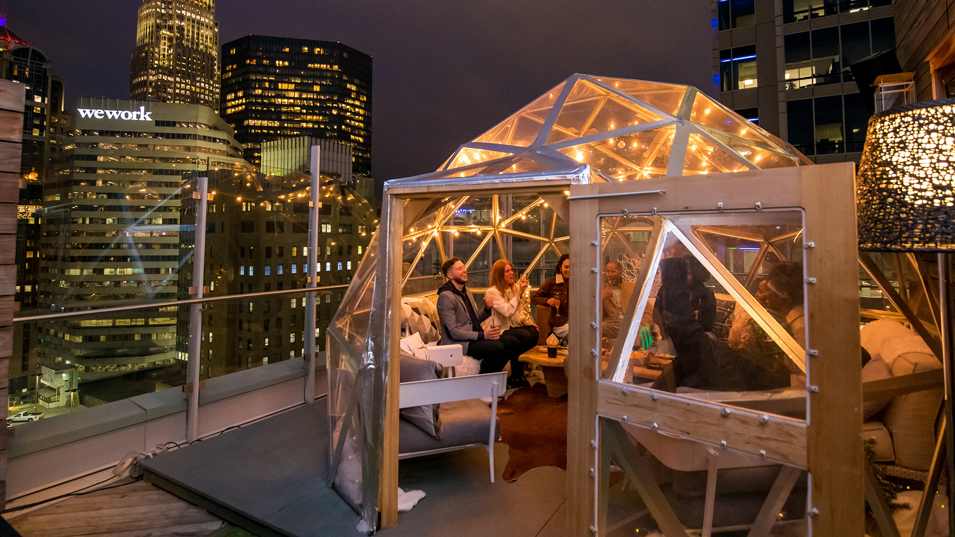 Rooftop happy hour at Merchant & Trade in Charlotte, North Carolina; Credit: Cody Hughes