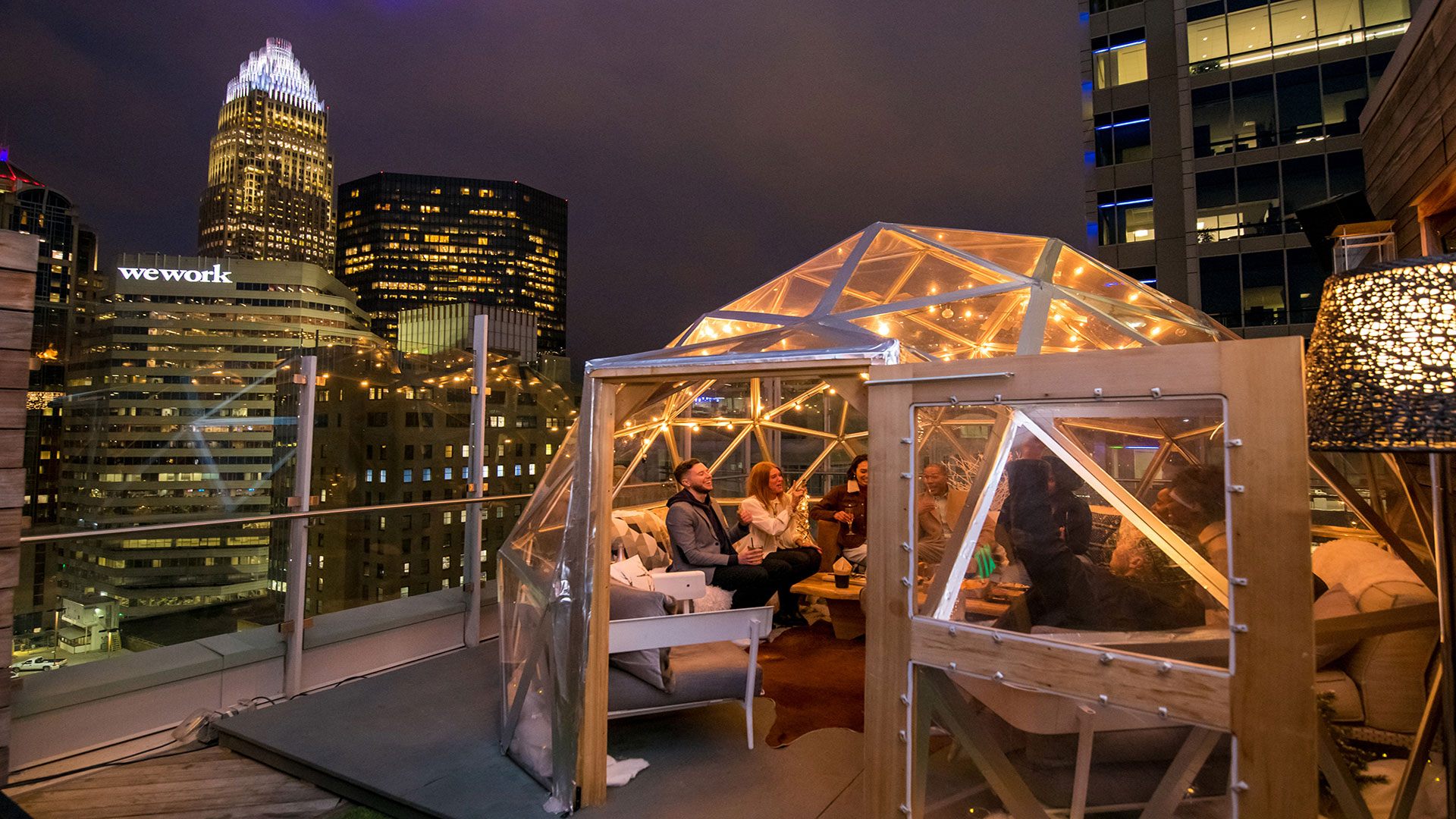 Rooftop happy hour at Merchant & Trade in Charlotte, North Carolina; Credit: Cody Hughes
