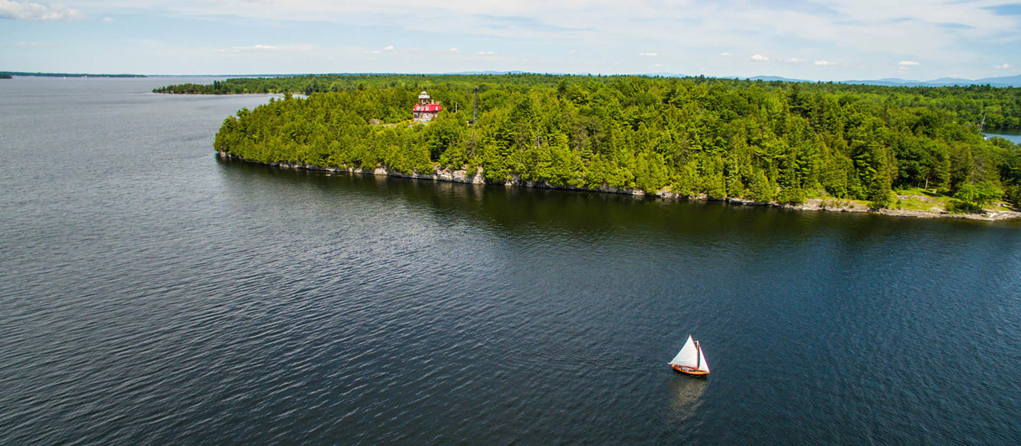 View of the Bluff Point Lighthouse on Valcour Island in Lake Champlain, New York; Credit: Bruce Carlin