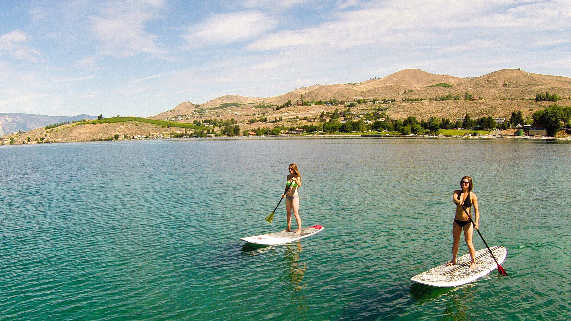 Paddleboarding on Lake Chelan near Chelan, Washington; Credit: Lake Chelan Chamber of Commerce