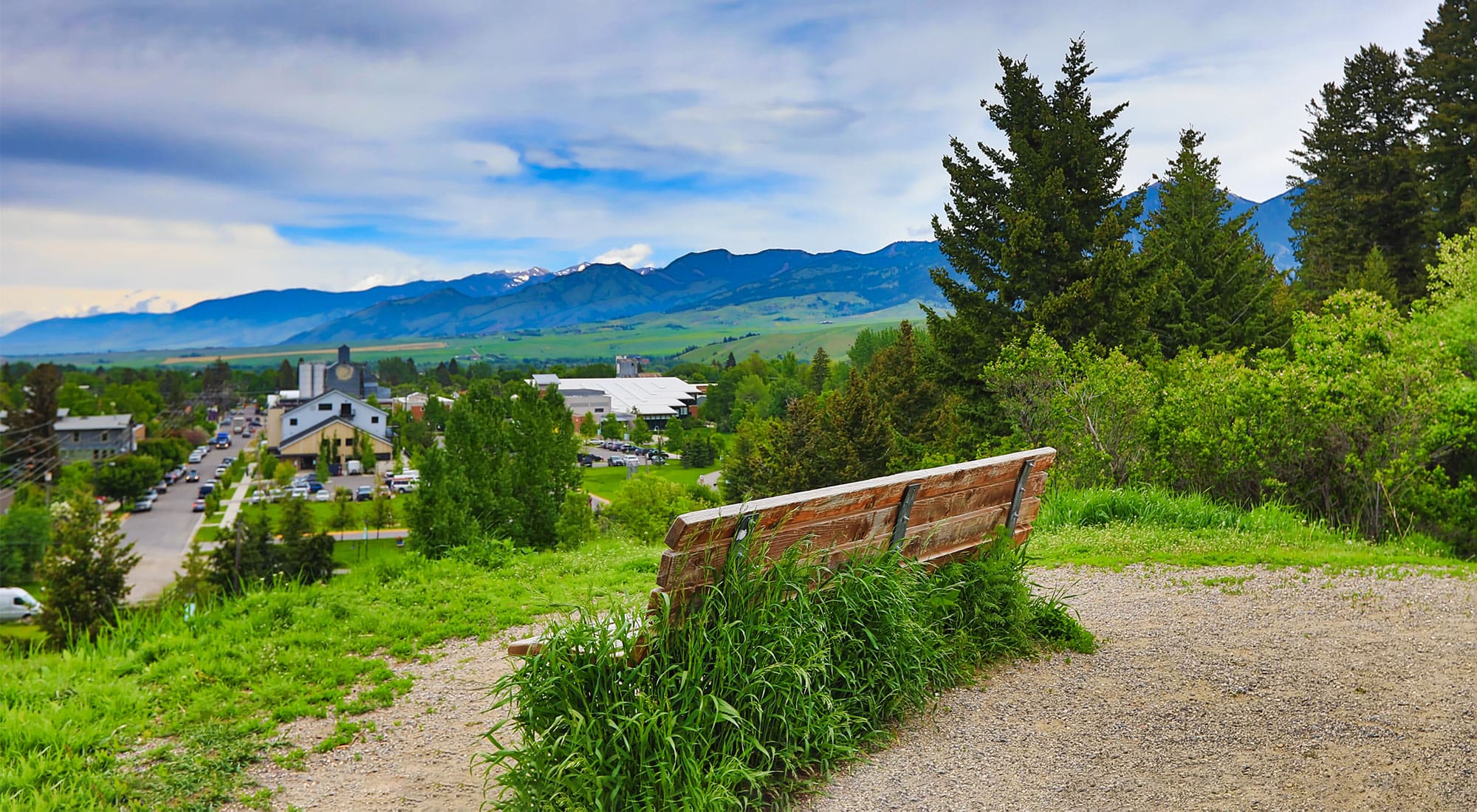 A bench along a hiking trail overlooking Bozeman, Montana