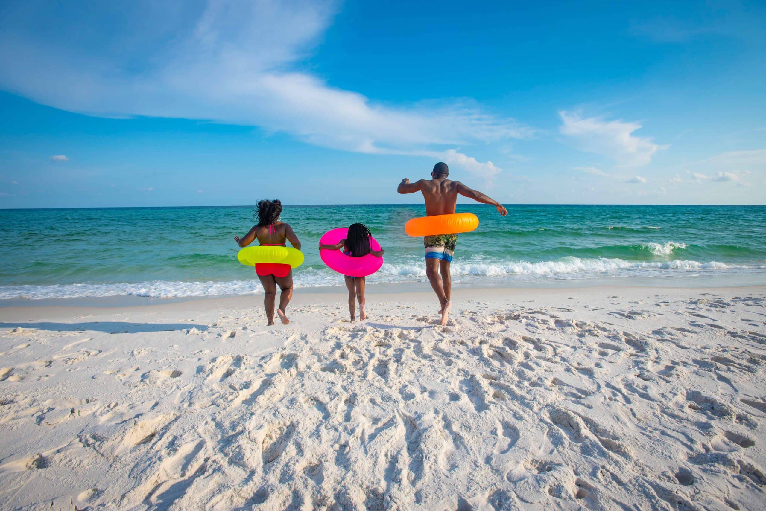 A family on Pensacola Beach in Pensacola, Florida