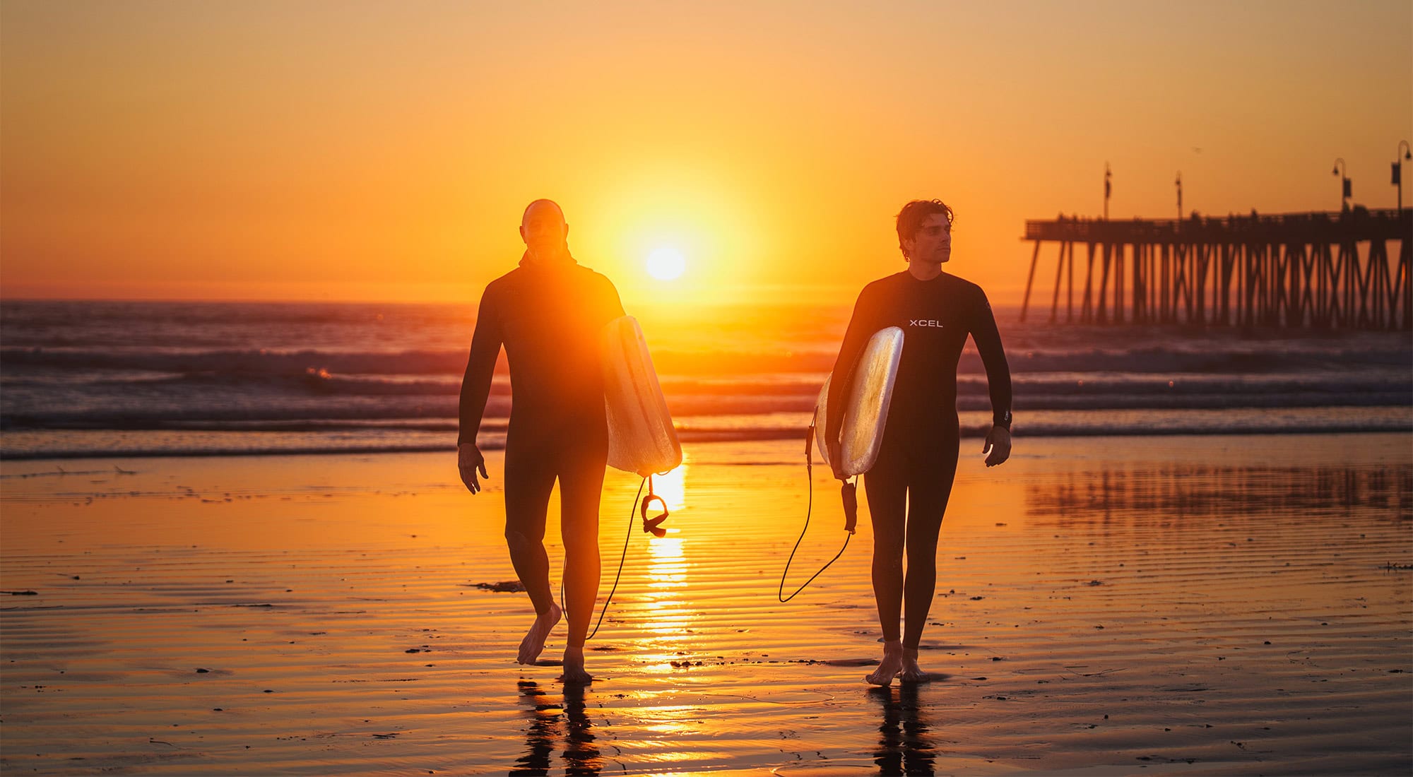 Surfers on Pismo Beach, California