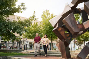 People walking through Park Central Square in Springfield, Missouri