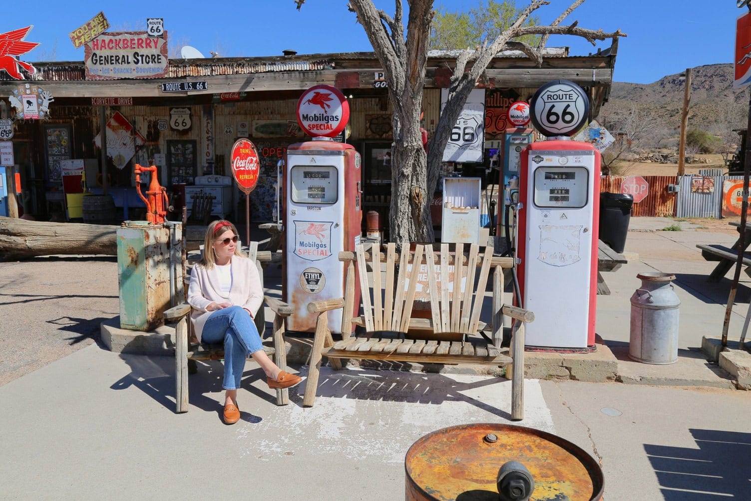 Vintage roadside general store with old signs and gas pumps along Route 66